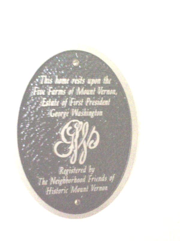 Historic plaque on homes of Belle Rive in Mount Vernon