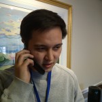 Stuart takes a phone call