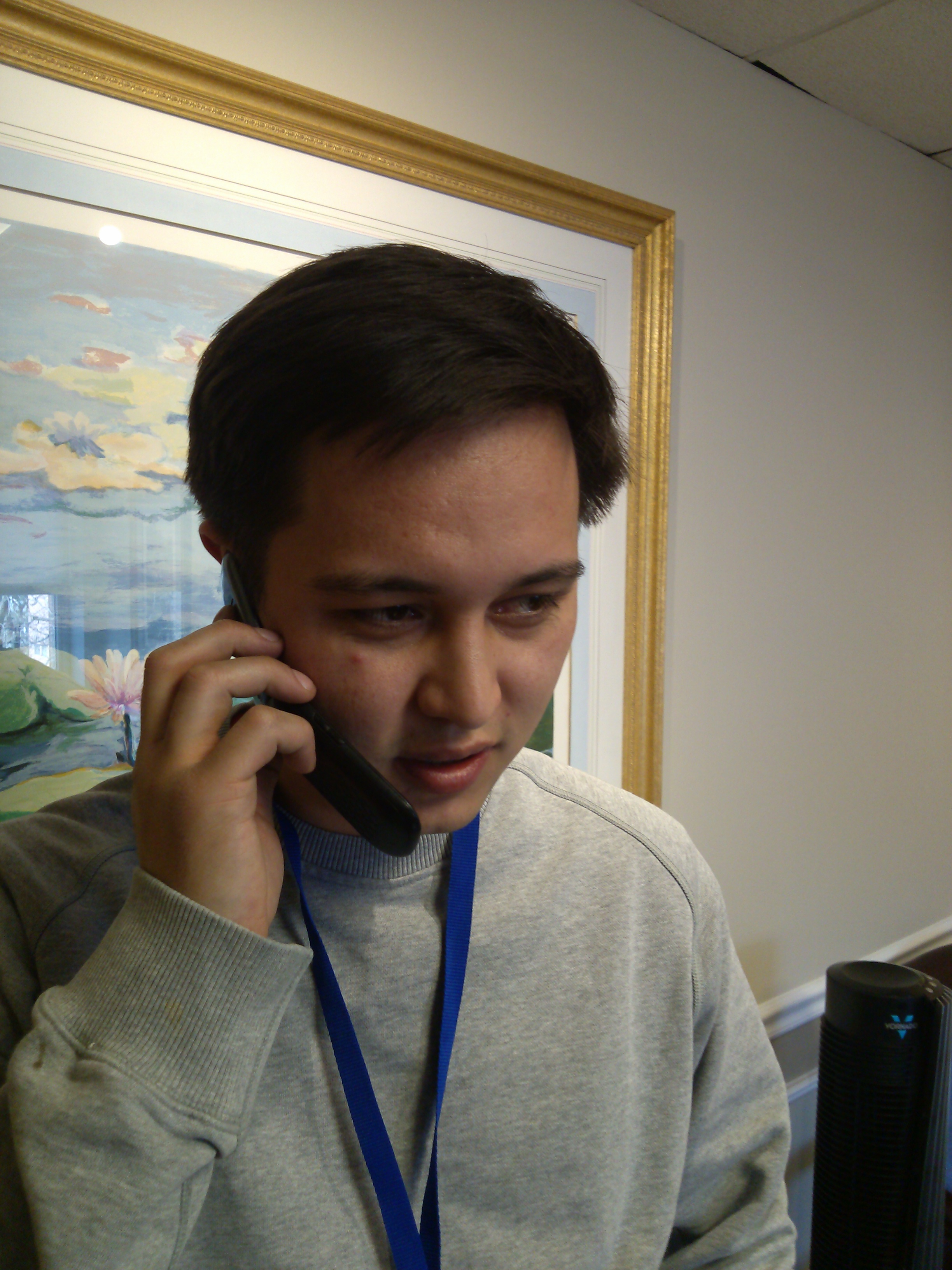 Stuart takes a phone call