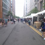 People walk past the art at the Reston Town Center