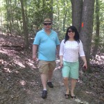 Will and Julie Nesbitt walk a path to the water park at Pohick Regional Park