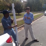 Realtor Stuart Nesbitt chats with a handyman