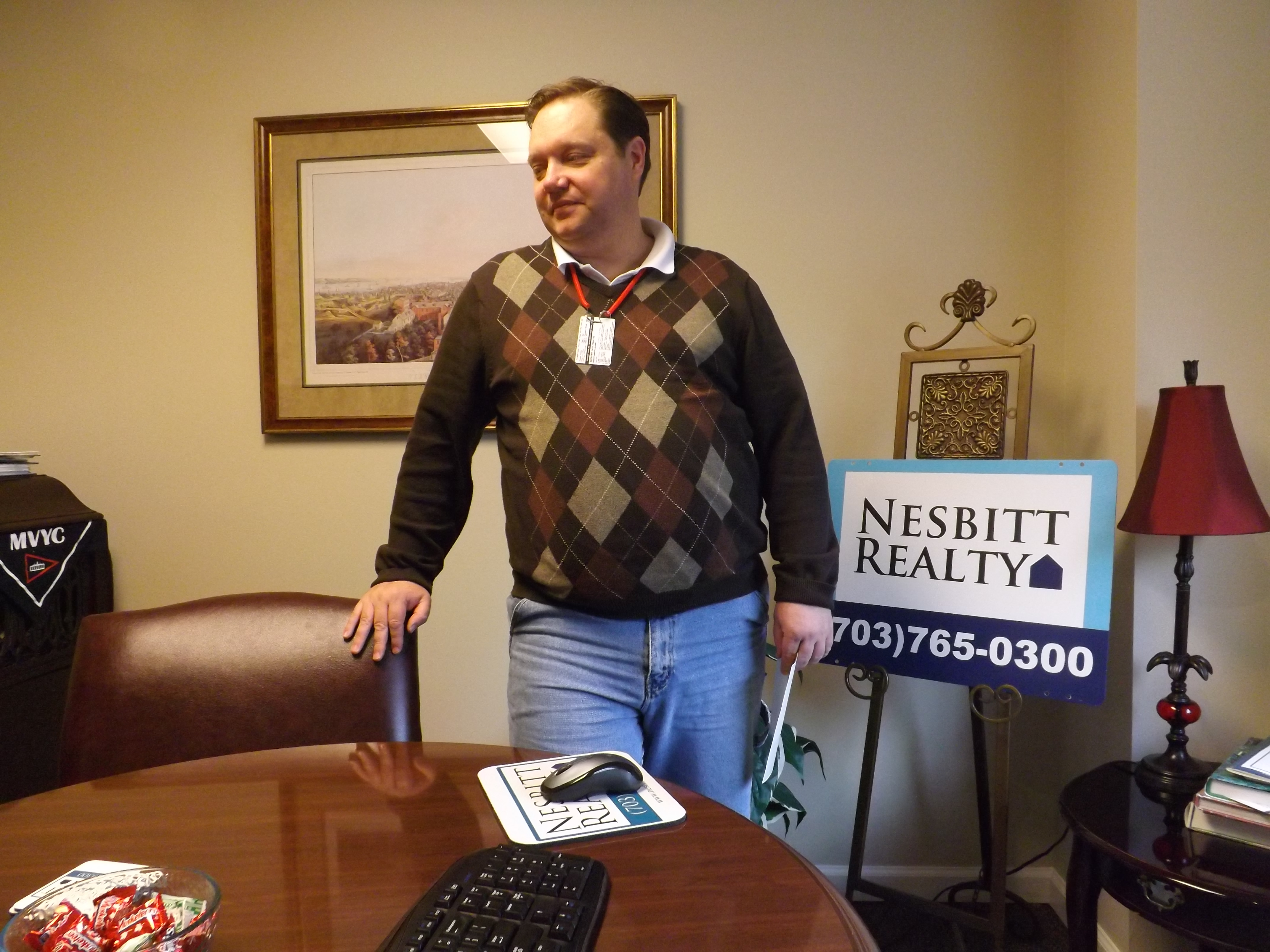 Will Nesbitt sits in the consultation room