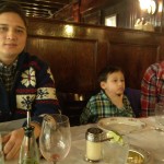 Father, son and brother at the dinner table