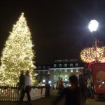 A Christmas tree shines in the night in Old Town Alexandria