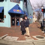 A couple stand outside of Austin Grill in Old Town, Alexandria