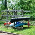 A canoe rack semi full