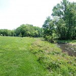 A bench before a creek