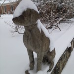 dog statue in winter