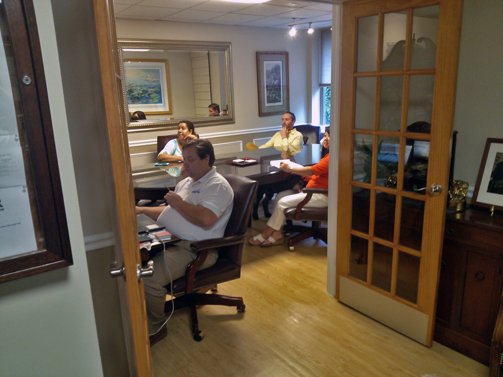 Broker and Agents in conference room