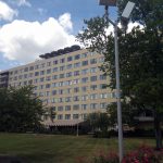Alternate route to River Towers units; commercial office space with awning