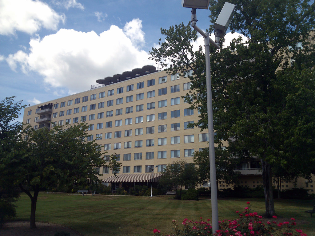 Alternate route to River Towers units; commercial office space with awning