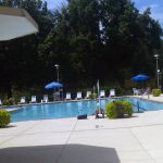 Outdoor pool amenity, furnished near trails