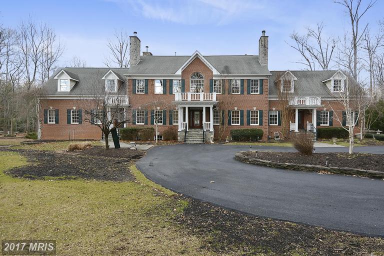 brick home, circular driveway